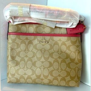 Coach  NWT Signature Print with Rose Colored Trim Crossbody